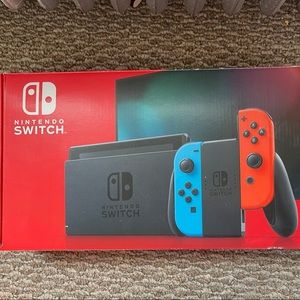 Red and blue Nintendo switch (plus games)